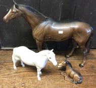 A group of four Beswick horses. Est. £20 - £30.