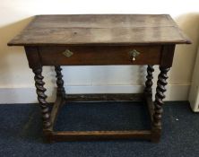 An early Georgian single drawer side table on barl