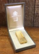 DUNHILL: A cased gold plated lighter. Est. £20 - £