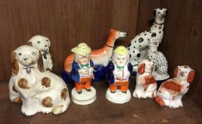 A collection of Staffordshire figures. Est. £30 -