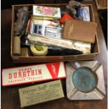 A box containing ashtrays, scissors etc. Est. £20