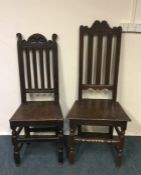 Two early Georgian oak chairs with panelled seats