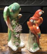 An Antique pottery figure of a Macaw together with