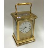 A large heavy brass mounted carriage clock. By Jam