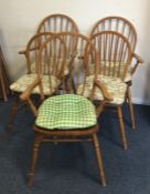 A set of five elm kitchen chairs together with mat