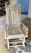 An old American painted rocking chair. Est. £20 -