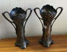 A pair of stylish WMF spill vases. Est. £20 - £30.