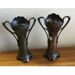 A pair of stylish WMF spill vases. Est. £20 - £30.