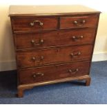 A Georgian mahogany chest of five drawers on brack