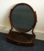 A Georgian mahogany toilet mirror of circular form