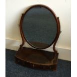 A Georgian mahogany toilet mirror of circular form