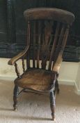 A large 18th Century Windsor chair with stretcher