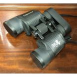 A cased pair of Bushnell binoculars. Est. £30 - £5