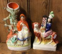 Two Staffordshire figures decorated in bright colo