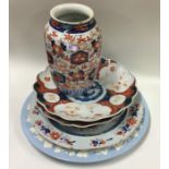 An Imari wall plate together with a vase etc. Est.