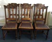 A good set of six carved oak dining chairs with le