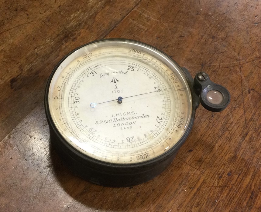 A leather cased travelling barometer by J Hicks of