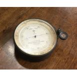 A leather cased travelling barometer by J Hicks of