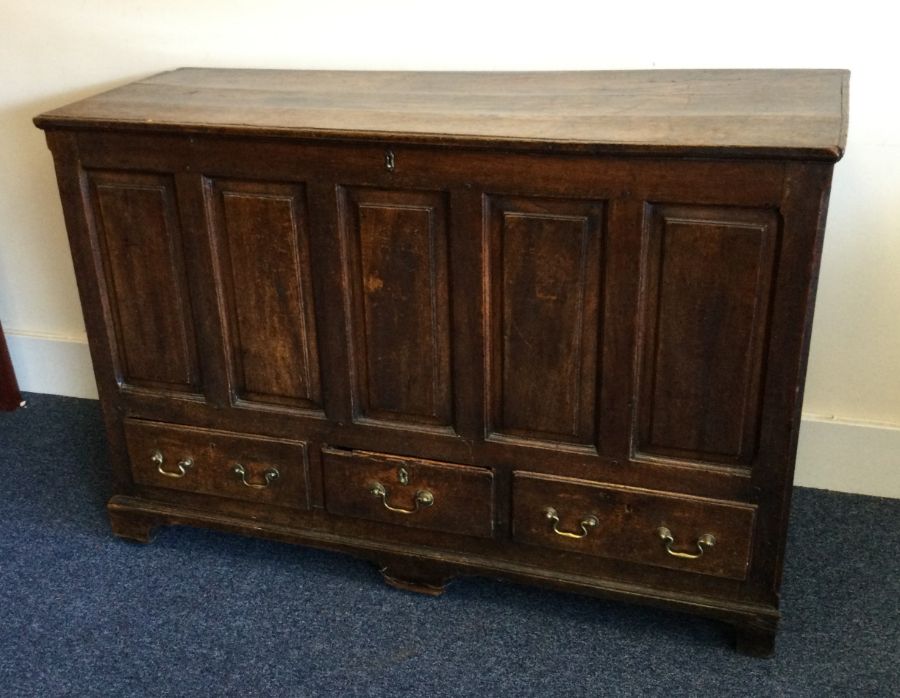 A large three drawer hinged top mule chest with pa