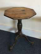 A Georgian oak pedestal table of shaped form. Est.