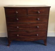 A Victorian mahogany chest of five drawers on shap