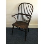 A good early Antique bow back chair on turned supp