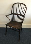 A good early Antique bow back chair on turned supp