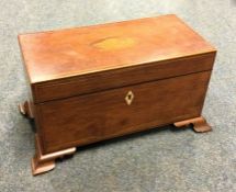 A good Georgian rectangular mahogany tea caddy wit