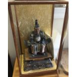 An unusual Antique Japanese figure depicting a 'Mi