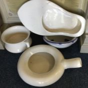 Four various porcelain bed pans. Est. £10 - £20.