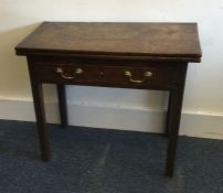 A Georgian mahogany rectangular hinged top table w