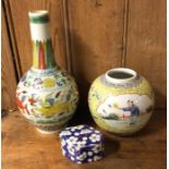 A 20th Century Chinese vase decorated in bright co