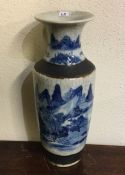 A Chinese blue and white crackleware vase decorate