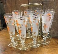 An Art Deco eight glass set on stand. Est. £20 - £