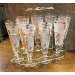 An Art Deco eight glass set on stand. Est. £20 - £