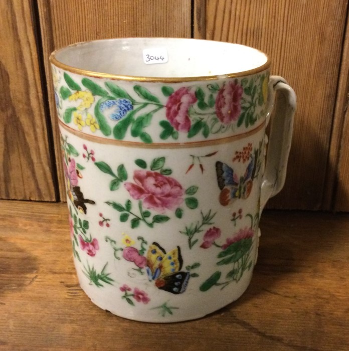 A rare 19th Century Famille Rose tankard decorated