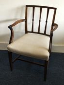 A good Georgian carver chair on tapering legs to s