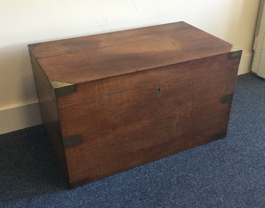 A mahogany hinged top box with brass mounts. Est.