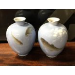 A pair of Chinese blue and white vases of baluster