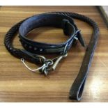 An old leather dog lead and collar together with t