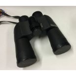 A cased pair of Pentax binoculars. Est. £30 - £50.