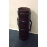 An old leather mounted umbrella stand. Est. £30 -