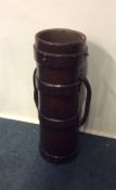 An old leather mounted umbrella stand. Est. £30 -