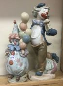 A novelty Lladro figure in the form of a clown tog