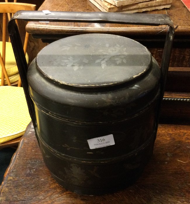 A brown lacquered trug with lift-off cover. Est. £