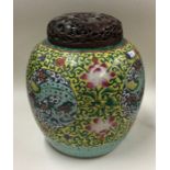 A large decorative Chinese ginger jar and cover wi