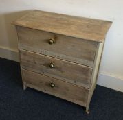 A pine chest of three drawers. Est. £30 - £50.