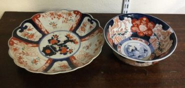 A decorative Imari bowl in bright colours together