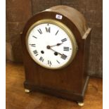 An Edwardian mahogany domed top mantle clock on br