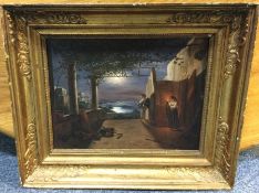 A gilt framed oil on panel depicting a romantic co